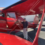 Si Robin with Staggerwing Standing Near Cockpit 2025